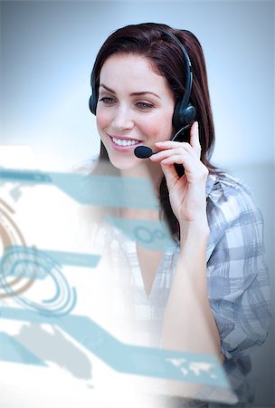 simsearch:400-07138128,k - Smiling attractive woman with headset using futuristic interface hologram Stock Photo - Budget Royalty-Free & Subscription, Code: 400-07138107