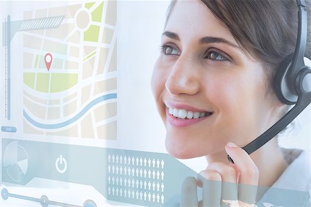 simsearch:400-07138128,k - Pretty call center employee using futuristic interface hologram looking at map Stock Photo - Budget Royalty-Free & Subscription, Code: 400-07138113