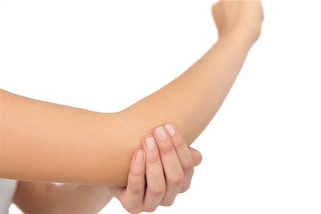 simsearch:400-06690149,k - Close up of young woman with a sore elbow on white background Stock Photo - Budget Royalty-Free & Subscription, Code: 400-07138252