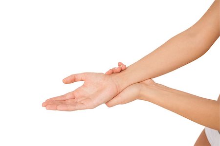 simsearch:632-06779266,k - Young woman holding her injured wrist on white background Stock Photo - Budget Royalty-Free & Subscription, Code: 400-07138260