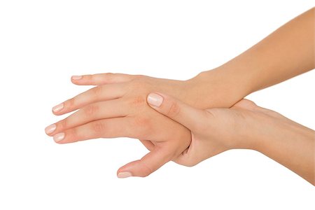simsearch:400-07138263,k - Young woman touching her injured hand on white background Stock Photo - Budget Royalty-Free & Subscription, Code: 400-07138262