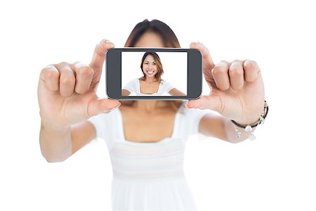 simsearch:400-06889355,k - Happy asian woman taking a selfie using her smartphone Stockbilder - Microstock & Abonnement, Bildnummer: 400-07139909