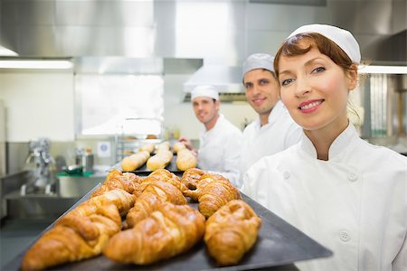simsearch:400-07140055,k - Three young bakers standing in a bakery  smiling at the camera Stock Photo - Budget Royalty-Free & Subscription, Code: 400-07140105