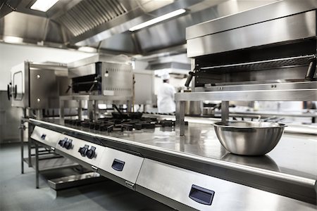 fornellino elettrico - Work surface and kitchen equipment in professional kitchen Fotografie stock - Microstock e Abbonamento, Codice: 400-07141075