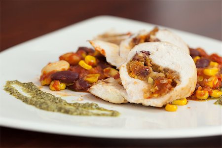 Close up of chicken dish with salsa on white plate Stock Photo - Budget Royalty-Free & Subscription, Code: 400-07141208