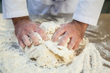 simsearch:400-07615342,k - Close up of chef kneading dough in professional kitchen Stock Photo - Budget Royalty-Free & Subscription, Code: 400-07141304