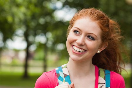 simsearch:400-07267769,k - Gorgeous cheerful student looking up on campus at college Stock Photo - Budget Royalty-Free & Subscription, Code: 400-07142030