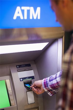 simsearch:400-07142149,k - Casual student withdrawing cash at an ATM Stock Photo - Budget Royalty-Free & Subscription, Code: 400-07142139