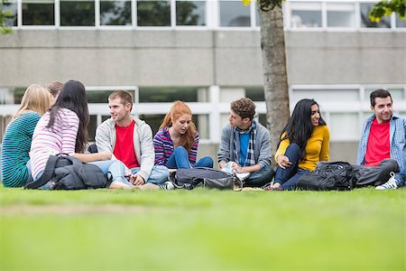 Group of young college students sitting in the park Stock Photo - Budget Royalty-Free & Subscription, Code: 400-07142573