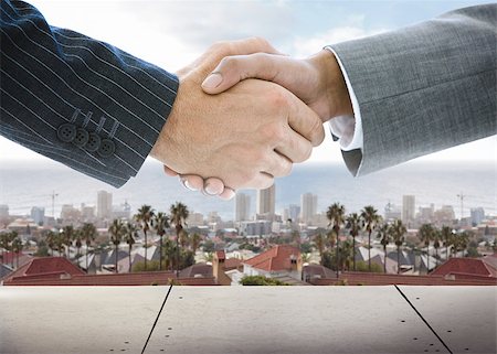 roof and hands - Close up of business people handshaking on background of townscape Stock Photo - Budget Royalty-Free & Subscription, Code: 400-07142868
