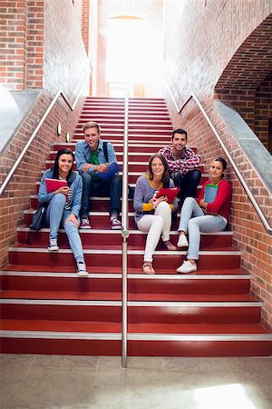 Group portrait of young college students sitting on stairs in the college Stock Photo - Budget Royalty-Free & Subscription, Code: 400-07143610