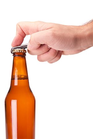 A hand opening a bottle of beer. Photographie de stock - Aubaine LD & Abonnement, Code: 400-07165343