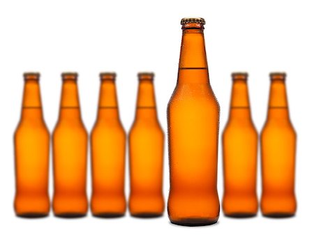 simsearch:400-07165360,k - A beer bottle stands out from a group of seven. Foto de stock - Royalty-Free Super Valor e Assinatura, Número: 400-07165352