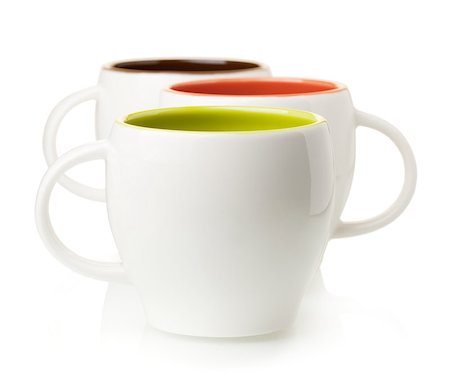 simsearch:400-06461761,k - Three color coffee cups, isolated on white background Fotografie stock - Microstock e Abbonamento, Codice: 400-07165542