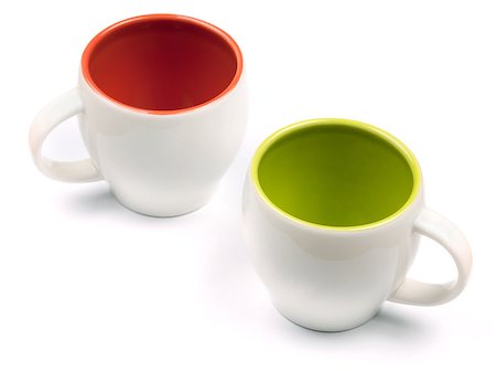 simsearch:400-06461761,k - Two empty color coffee cups. Isolated on white background Fotografie stock - Microstock e Abbonamento, Codice: 400-07165558