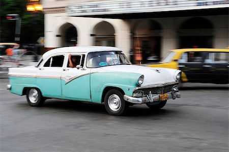 simsearch:6129-09044104,k - HAVANA-JUNE 6:Classic old american car on the streets of Havana, Cuba on June 26, 2013.Under the current law that the government plans to change before 2012,Cubans can only buy and sell cars that were in use before 1959 Photographie de stock - Aubaine LD & Abonnement, Code: 400-07166075