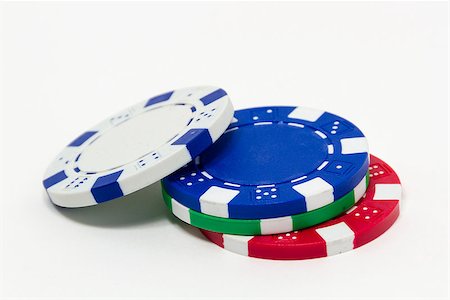 simsearch:400-04672615,k - Stack of poker chips isolated on white background Stock Photo - Budget Royalty-Free & Subscription, Code: 400-07166248