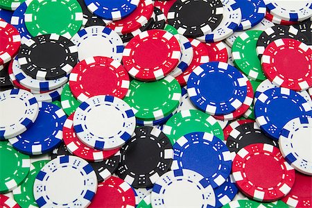 simsearch:400-04672615,k - Pile of poker chips Stock Photo - Budget Royalty-Free & Subscription, Code: 400-07166251