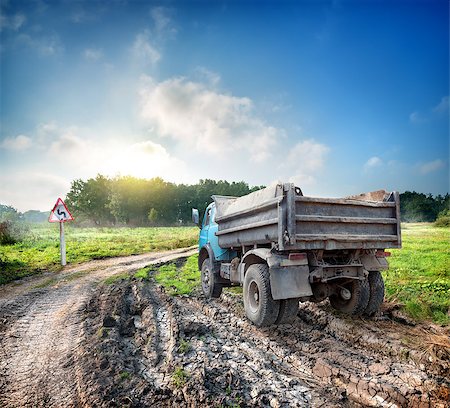 simsearch:400-07189007,k - Truck on a country road in field Fotografie stock - Microstock e Abbonamento, Codice: 400-07166279