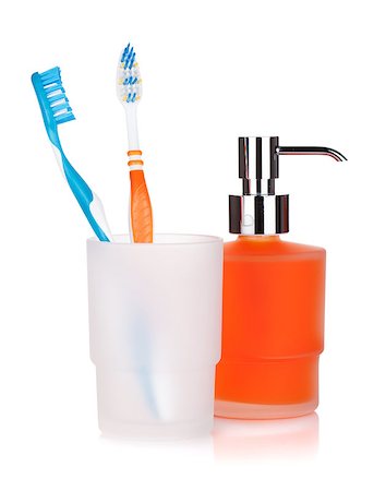 simsearch:400-04552289,k - Two colorful toothbrushes and liquid soap. Isolated on white background Foto de stock - Super Valor sin royalties y Suscripción, Código: 400-07166576