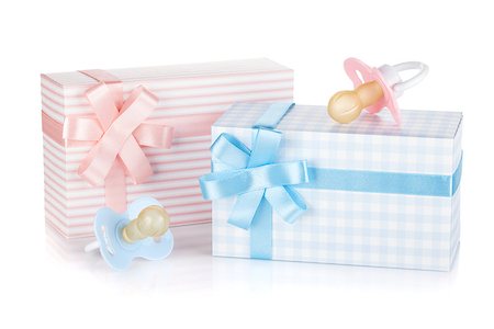simsearch:694-03328113,k - Gift box and pacifier for little boy and girl. Isolated on white background Fotografie stock - Microstock e Abbonamento, Codice: 400-07166608