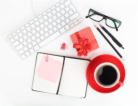 Red coffee cup, gift box and office supplies. View from above Stock Photo - Budget Royalty-Free & Subscription, Code: 400-07166666