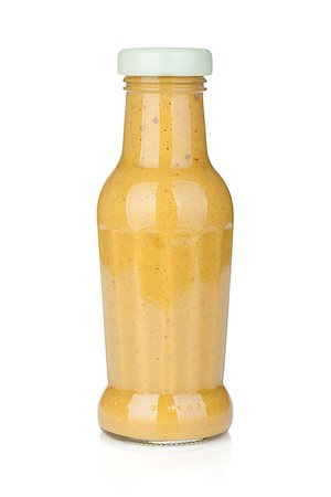 simsearch:400-06919406,k - Mustard glass bottle. Isolated on white background Foto de stock - Royalty-Free Super Valor e Assinatura, Número: 400-07166721