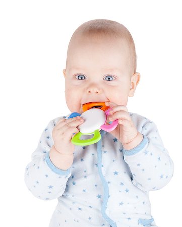 simsearch:400-07506232,k - Cute baby is holding toy. Isolated on white background Stock Photo - Budget Royalty-Free & Subscription, Code: 400-07166730