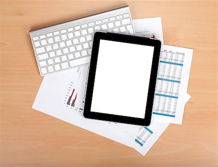 simsearch:400-08530598,k - Tablet with blank screen over papers with numbers and charts. View from above Stock Photo - Budget Royalty-Free & Subscription, Code: 400-07166749