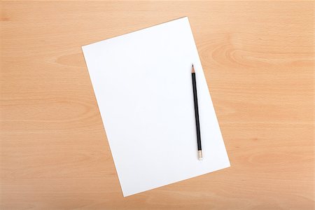simsearch:400-08378888,k - Blank paper with pencil on wood table Stock Photo - Budget Royalty-Free & Subscription, Code: 400-07166752