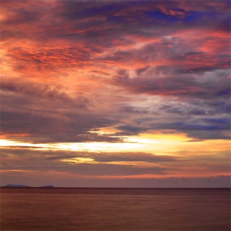 dawn red sky - beautiful sunset over Andaman Sea, in Thailand Stock Photo - Budget Royalty-Free & Subscription, Code: 400-07167021
