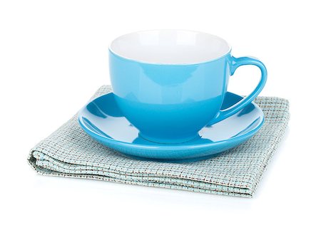 simsearch:400-04799995,k - Blue coffee cup over kitchen towel. Isolated on white background Stock Photo - Budget Royalty-Free & Subscription, Code: 400-07167113