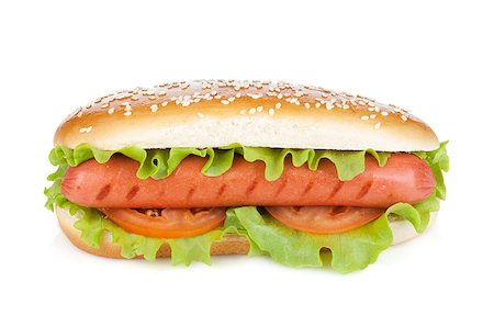 simsearch:400-04290264,k - Hot dog with lettuce and tomato slices. Isolated on white background Stockbilder - Microstock & Abonnement, Bildnummer: 400-07167124