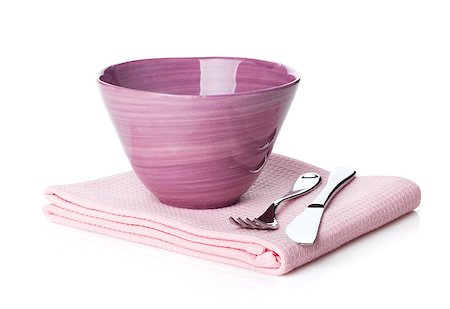 simsearch:400-04799995,k - Salad bowl and silverware over kitchen towel. Isolated on white background Stock Photo - Budget Royalty-Free & Subscription, Code: 400-07167136