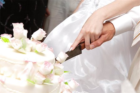 simsearch:400-04741437,k - cutting a white wedding cake Stock Photo - Budget Royalty-Free & Subscription, Code: 400-07167176