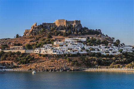 Lindos with the castle above on the Greek Island of Rhodes Stock Photo - Budget Royalty-Free & Subscription, Code: 400-07167285