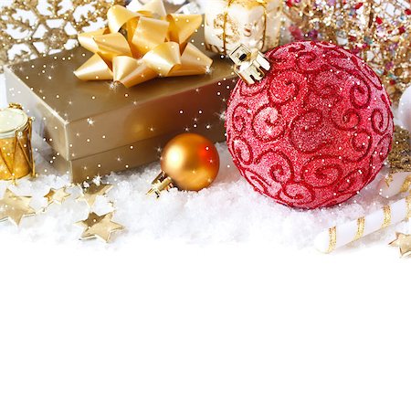 Christmas gold and red decoration on a snow. Stock Photo - Budget Royalty-Free & Subscription, Code: 400-07167295