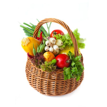 simsearch:400-06700975,k - Fresh kitchen garden vegetables in a wicker basket on a white. Stock Photo - Budget Royalty-Free & Subscription, Code: 400-07167296