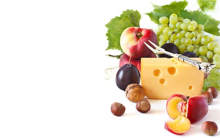 Cheese and fruit on a white background. Stock Photo - Budget Royalty-Free & Subscription, Code: 400-07167298