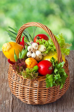 Basket of fresh ripe vegetables on an old garden board. Stock Photo - Budget Royalty-Free & Subscription, Code: 400-07167344