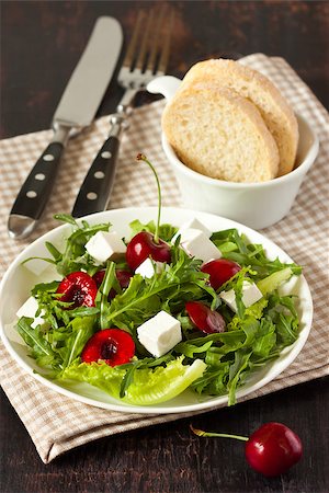 simsearch:400-05346545,k - Green salad with soft cheese and sweet cherry. Fotografie stock - Microstock e Abbonamento, Codice: 400-07167360