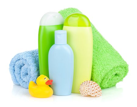 Bath bottles, towel and rubber duck. Isolated on white background Stock Photo - Budget Royalty-Free & Subscription, Code: 400-07167558