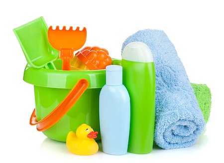 Beach baby toys, towels and bottles. Isolated on white background Stock Photo - Budget Royalty-Free & Subscription, Code: 400-07167559