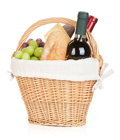 Picnic basket with bread, cheese, grape and wine bottles. Isolated on white background Stock Photo - Budget Royalty-Free & Subscription, Code: 400-07167607