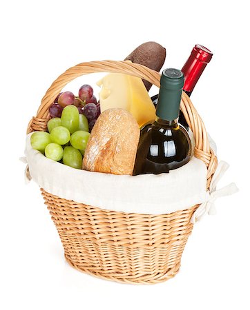 Picnic basket with bread, cheese, grape and wine bottles. Isolated on white background Stock Photo - Budget Royalty-Free & Subscription, Code: 400-07167610
