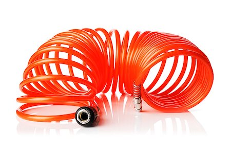 simsearch:400-07167932,k - Orange red thin spiral air hose used for pneumatic tools. Isolated on white with natural reflection. Foto de stock - Super Valor sin royalties y Suscripción, Código: 400-07167924