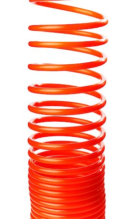 simsearch:400-07167932,k - Orange red thin spiral air hose used for pneumatic tools. Foto de stock - Super Valor sin royalties y Suscripción, Código: 400-07167920