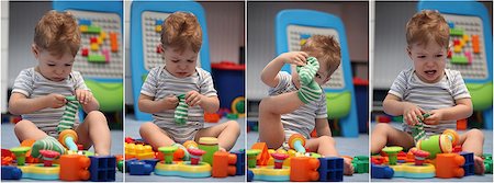 simsearch:400-07506232,k - A funny baby boy trying to dress socks in children's room Stock Photo - Budget Royalty-Free & Subscription, Code: 400-07168052