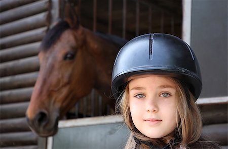 Portrait of little girl and brown Horse Stock Photo - Budget Royalty-Free & Subscription, Code: 400-07168062