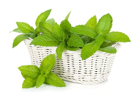 simsearch:400-06531157,k - Basket of fresh mint. Isolated on white background Foto de stock - Royalty-Free Super Valor e Assinatura, Número: 400-07168508